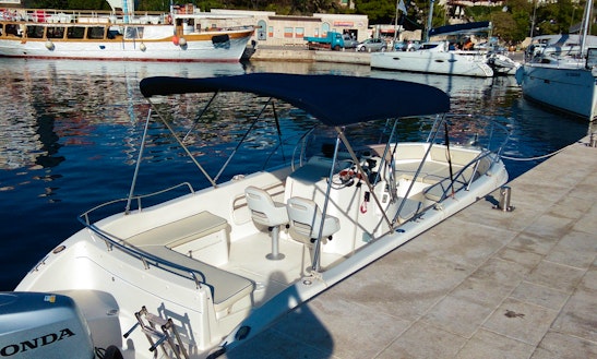 Rent Saver 690 Open Boat With Bimini Top In Sumartin, Croatia