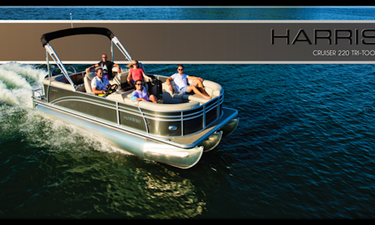 22' Pontoon With Rear Facing Loungers Offers Seating For 12 Passengers