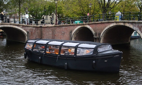 Private Tour On Electric Canal Boat In Amsterdam, The Netherlands