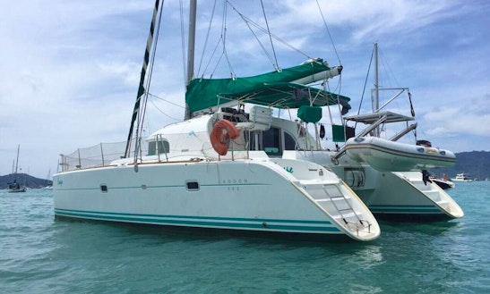 Enjoy The Experience Of Cruising On Lagoon 380 Catamaran Around This Lovely Maiton Island